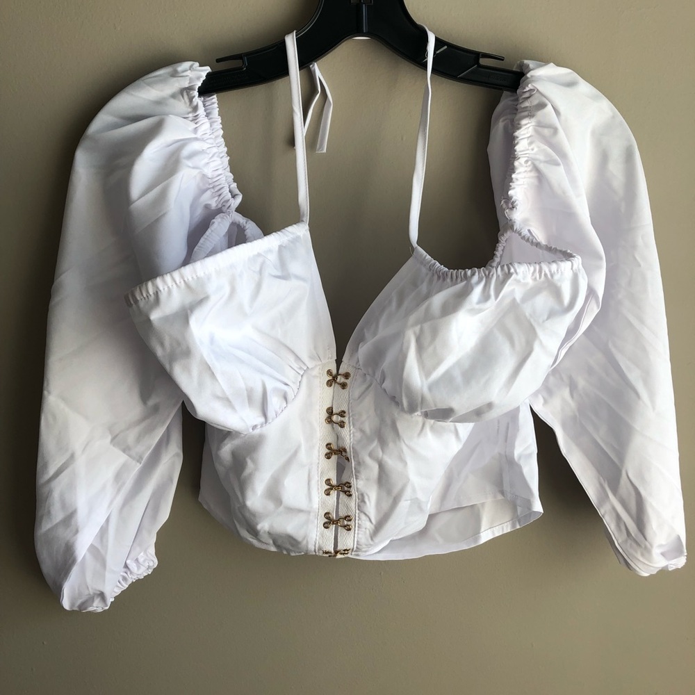 White, drop shoulder crop top.